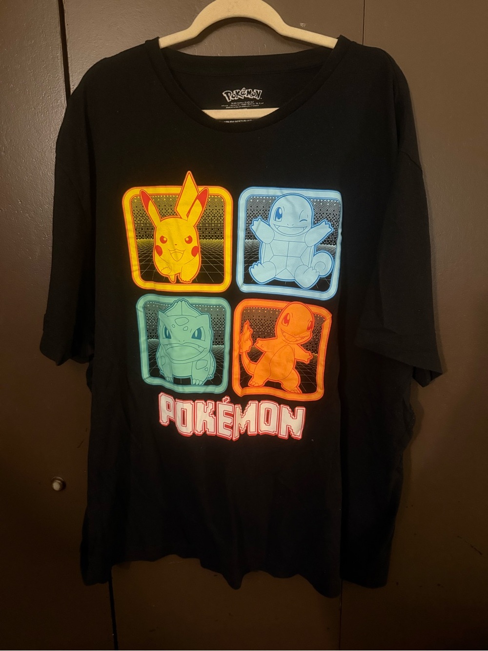 Pokemon Black Tee with Neon Pikachu, Squirtle, Bulbasaur & Charmander Panels